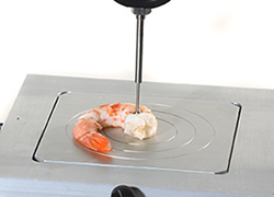 Grips and fixtures for meat, poultry and fish testing
